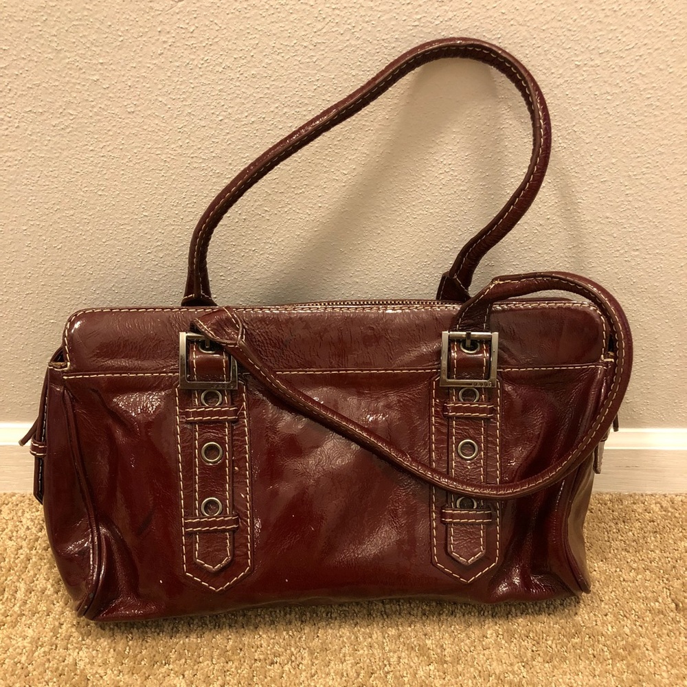 Rafe dark red patent leather handbag.